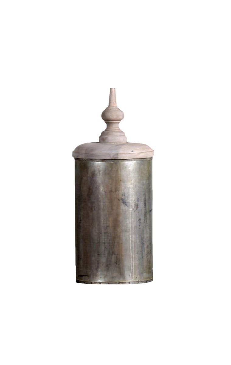 Villa 2 Jasmine Box With Lid has galvanized Iron Sheet cylindrical vase with Vintage Finish called Lota Finish. The Hand Carved Lid is a beautiful Addition and adds to character of the Vase. The Lid is finished in Weathered Gray Vintage Finish.