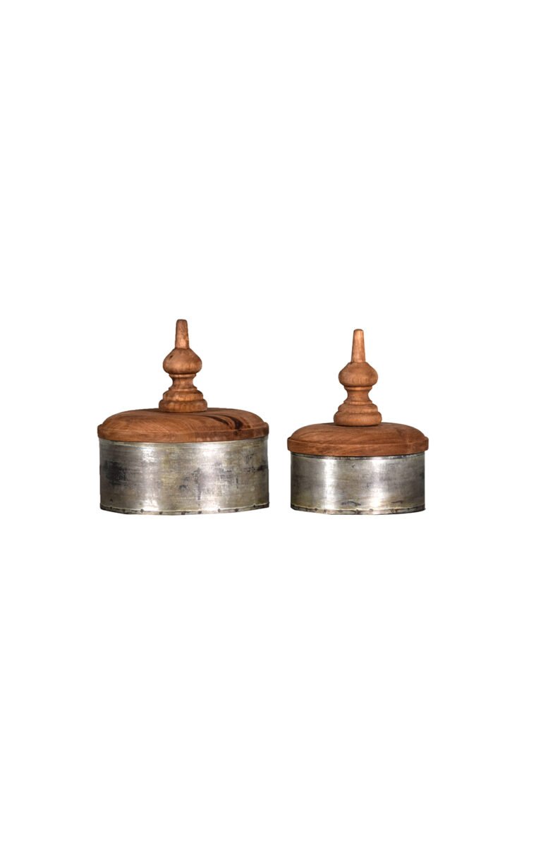 Villa 2 Jasmine box with lid has galvanized iron sheet cylindrical vase with vintage-inspired finish called lota finish. The hand carved lid is a beautiful addition and adds to character of the vase. The lid is finished in weathered vintage-inspired finish.