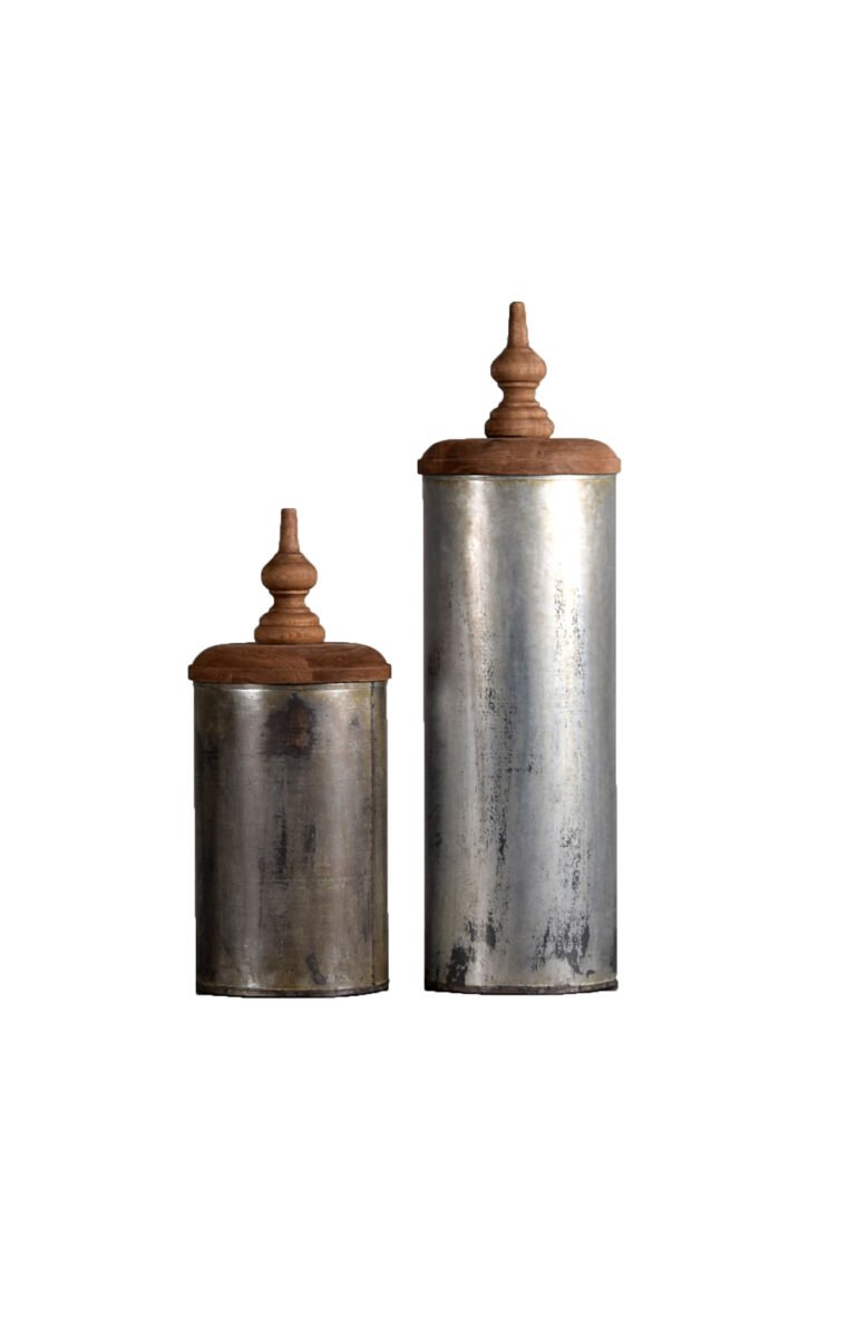 Villa 2 Alladin Vase With Wire has galvanized Iron Sheet cylindrical vase with Vintage Finish called Lota Finish. The Hand Carved Lid is a beautiful Addition and adds to character of the Vase. The Lid is finished in Weathered Vintage Finish.