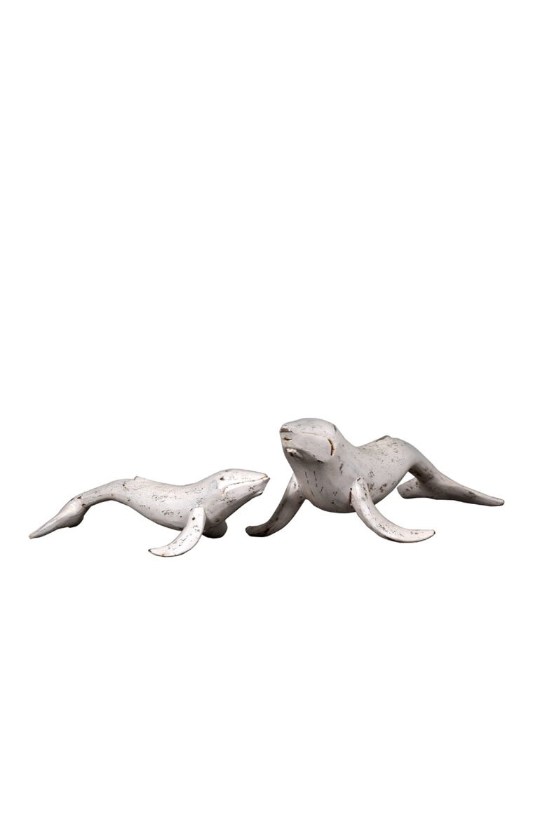 Villa 2 Wooden Seal is hand carved figurine finished in Distressed Antique White Finish. This a very beautiful addition to any Coastal or Modern Architecture room.